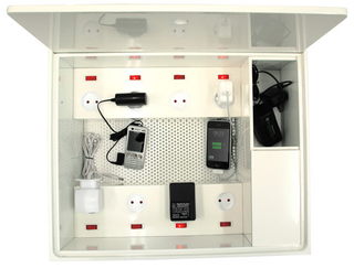 Illustration for article titled Powerwise Desk Is a Giant Gadget Charging Station